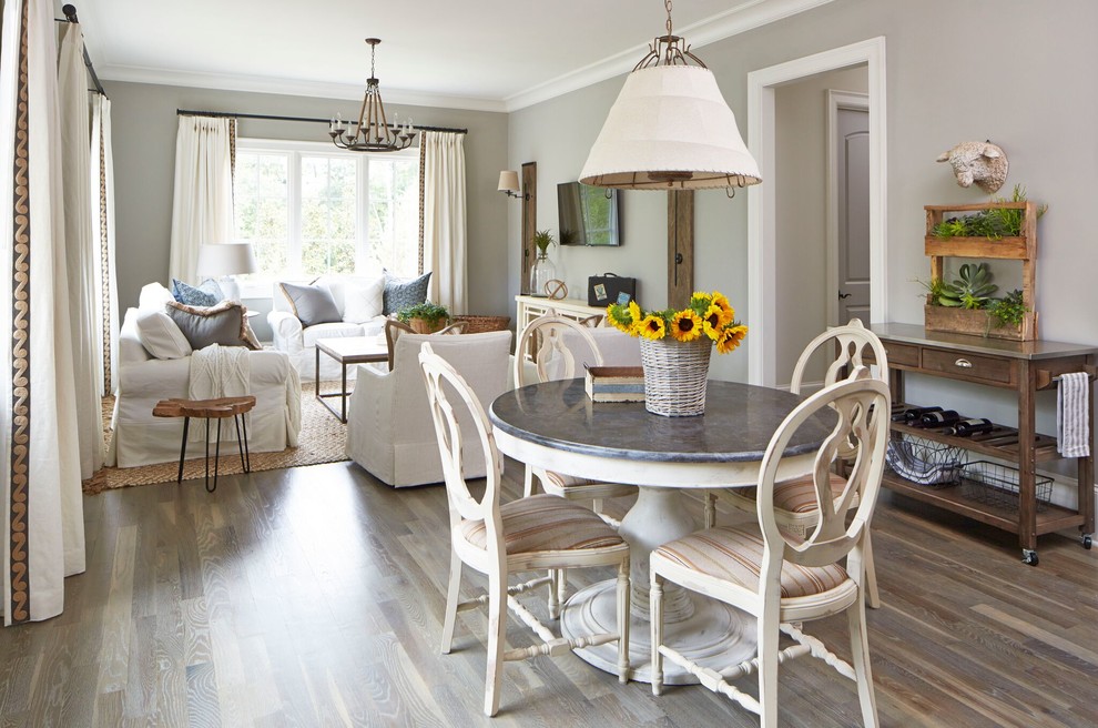 Inspiration for a mid-sized country dining room in Atlanta with grey walls, medium hardwood floors and no fireplace.
