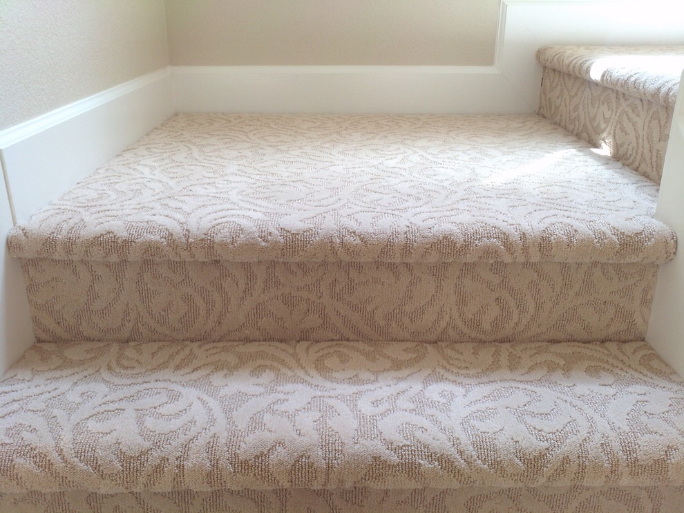Inspiration for a mid-sized transitional carpeted l-shaped staircase in San Francisco with carpet risers.