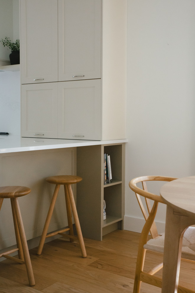 Example of a transitional kitchen design in Vancouver