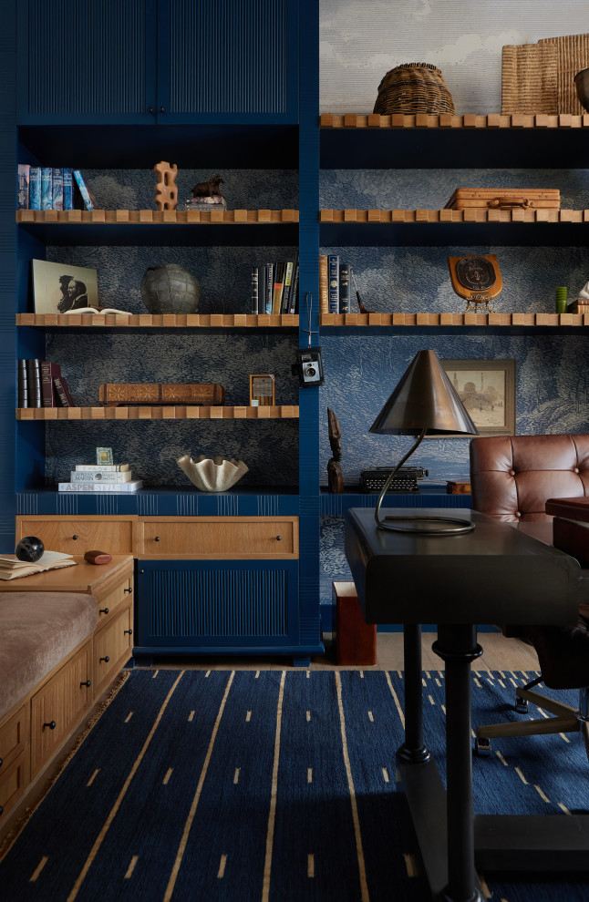 Barrel & Beam - One of the most unique spaces in the home is the piano library, where Alan spends a great deal of time reading and working. This sunlit corner of the house is being reimagined with custom millwork, with built-in shelves that will stretch across the entire wall. The craftsmanship of the shelving will be a focal point of the space, with intricate details and seamless integration into the room’s architecture. The design is not only functional but also visually striking, offering a sophisticated way to display books, keepsakes, and treasures while adding depth and elegance to the room.
The layout reflects both Alan’s daily routine and the family’s love for music, as the space also serves as a place for piano practice. The natural light streaming through the windows creates a serene environment, perfect for reading, reflection, or quiet moments. Complementing this warmth is a unique lighting design, which will highlight the millwork and cast a soft, inviting glow throughout the room. This one-of-a-kind lighting enhances the beauty of the built-ins, making the space feel both cozy and refined at any hour of the day.