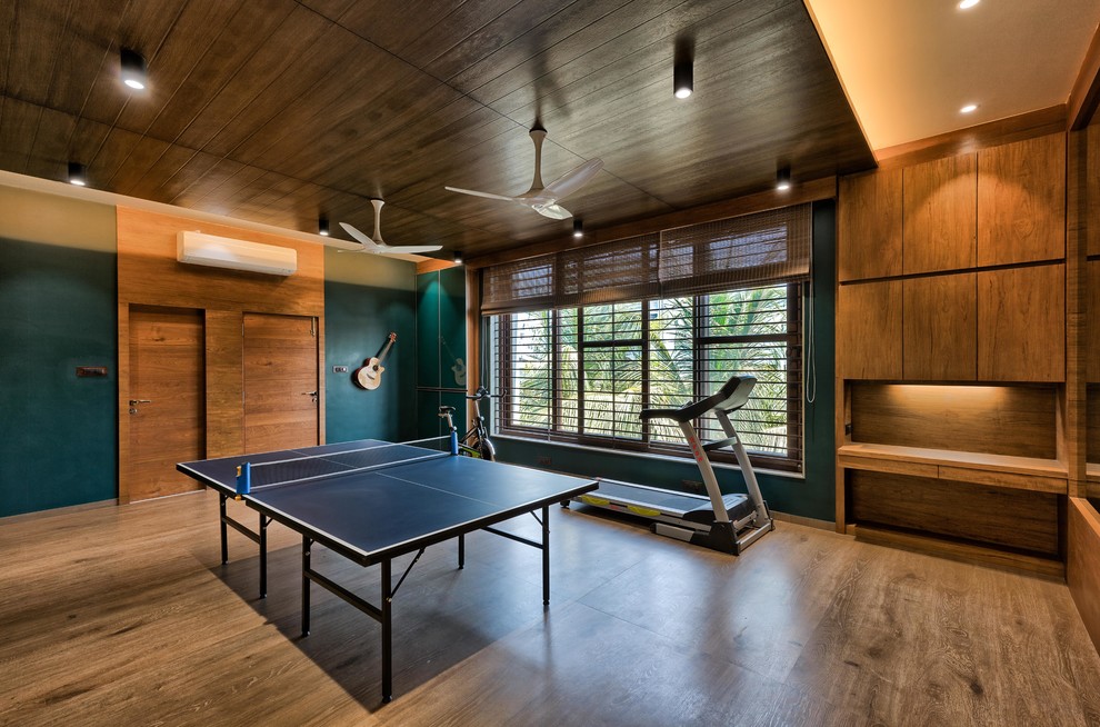Inspiration for a tropical home gym in Ahmedabad.