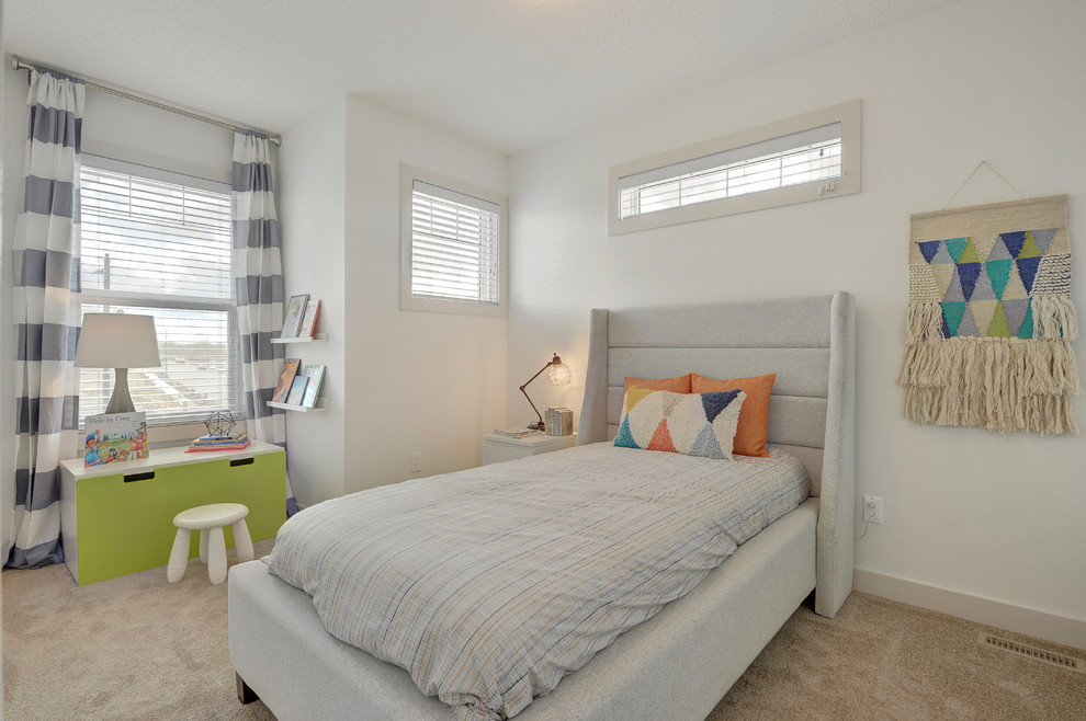 Photo of a small transitional bedroom in Edmonton with white walls, carpet and beige floor.