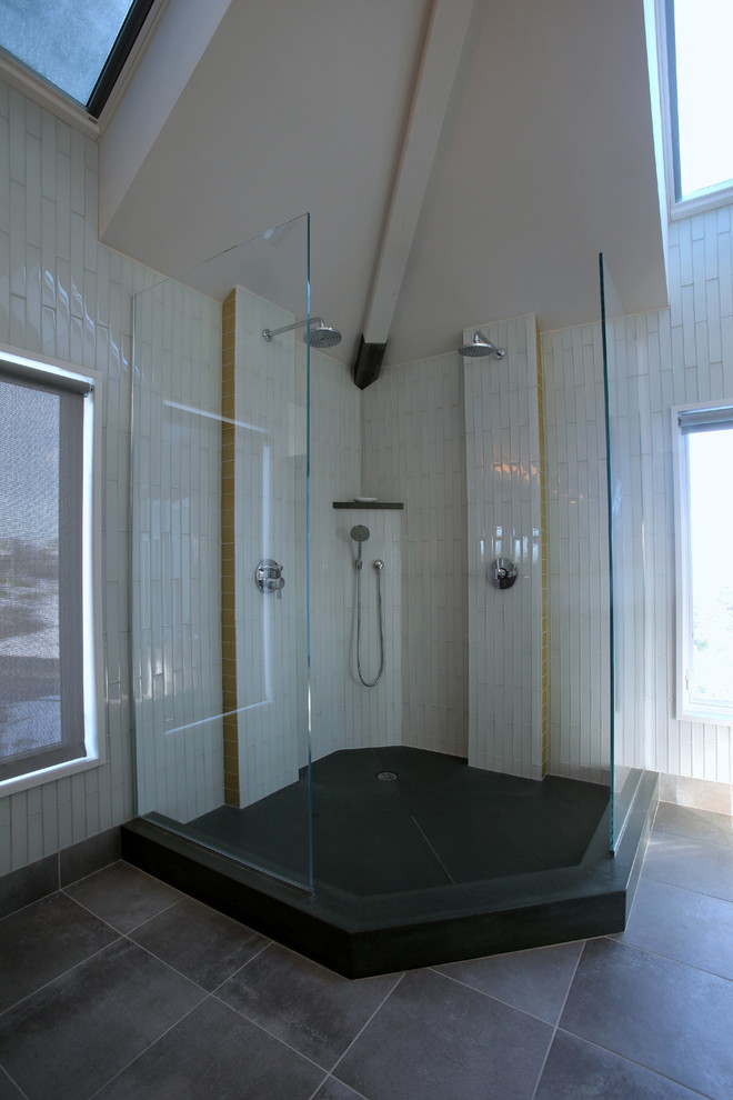 Mid-sized transitional master corner shower photo in Boston with flat-panel cabinets, dark wood cabinets, a hot tub, gray walls, an undermount sink and granite countertops