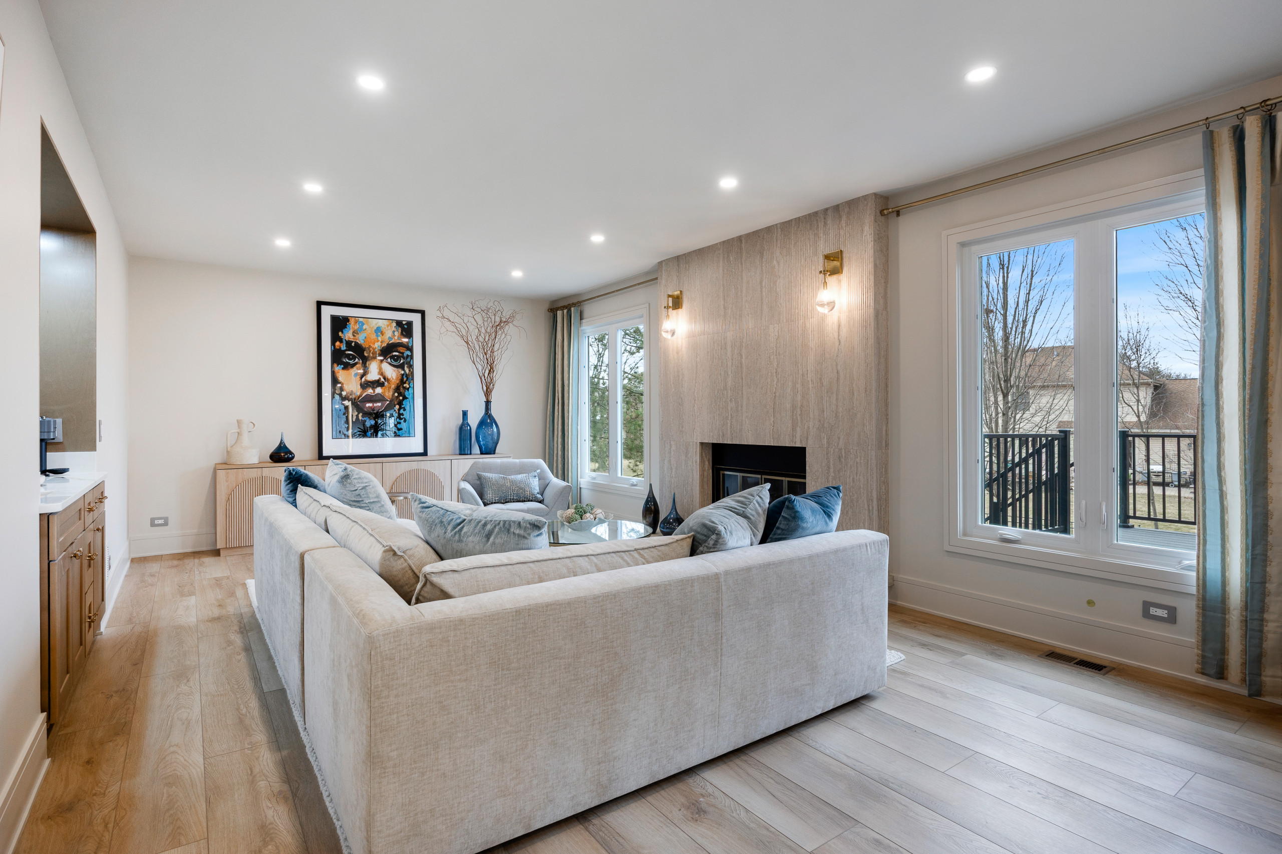 Family Room with Custom Fireplace and Wet Bar