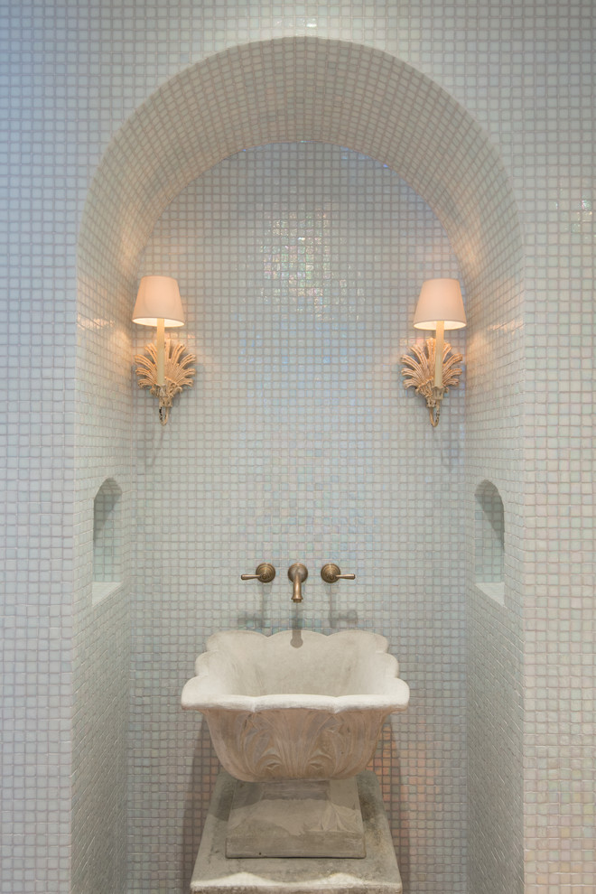 Photo of a traditional powder room in Cincinnati with a vessel sink, white tile and mosaic tile.