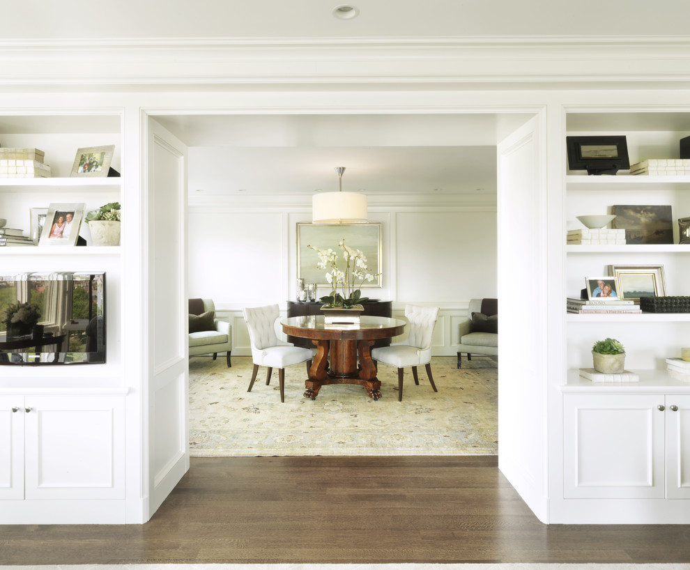 Design ideas for a traditional dining room in Boston with white walls.