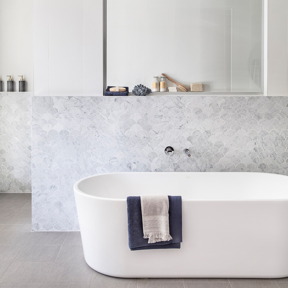 Design ideas for a large beach style master bathroom in Sydney with shaker cabinets, white cabinets, a corner shower, white tile, ceramic tile, white walls, cement tiles, an undermount sink, marble benchtops, green floor, a hinged shower door and white benchtops.
