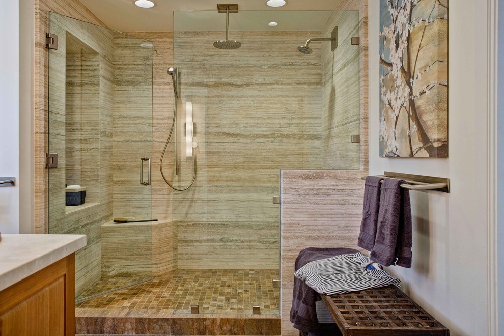 This is an example of a transitional bathroom in San Diego with an alcove shower, beige tile, white walls, a niche and a shower seat.