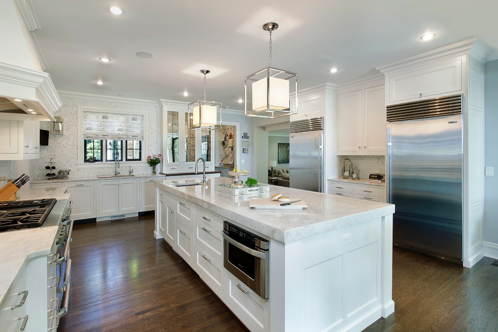 Design ideas for a traditional u-shaped kitchen in Other with stainless steel appliances.