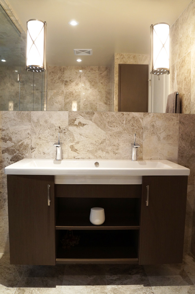 Design ideas for a mid-sized contemporary 3/4 bathroom in Toronto with open cabinets, dark wood cabinets, an alcove shower, a one-piece toilet, beige tile, stone tile, beige walls, limestone floors, a trough sink and engineered quartz benchtops.