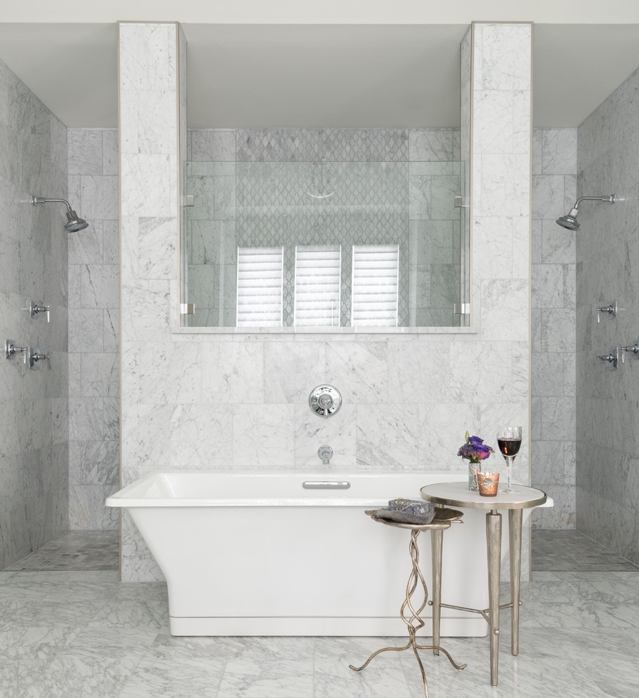 This is an example of a transitional master bathroom in Dallas with shaker cabinets, white cabinets, a freestanding tub, a double shower, gray tile, marble, grey walls, marble floors, marble benchtops, grey floor and an open shower.