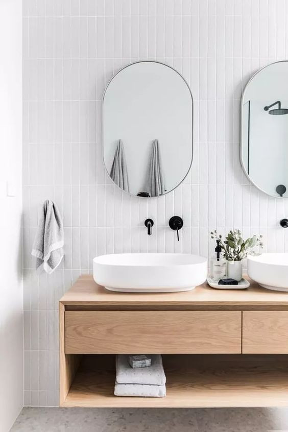 Inspiration for a mid-sized modern master bathroom in Dallas with flat-panel cabinets, medium wood cabinets, white tile, ceramic tile, white walls, terrazzo floors, wood benchtops, grey floor, a double vanity and a built-in vanity.