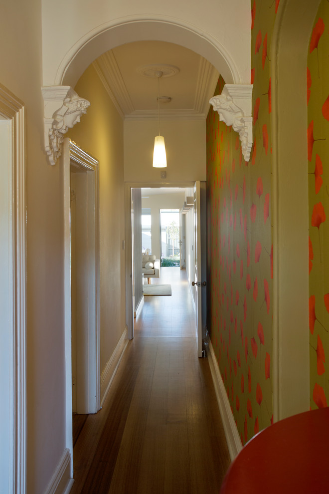 Small contemporary hallway in Sydney with light hardwood floors.