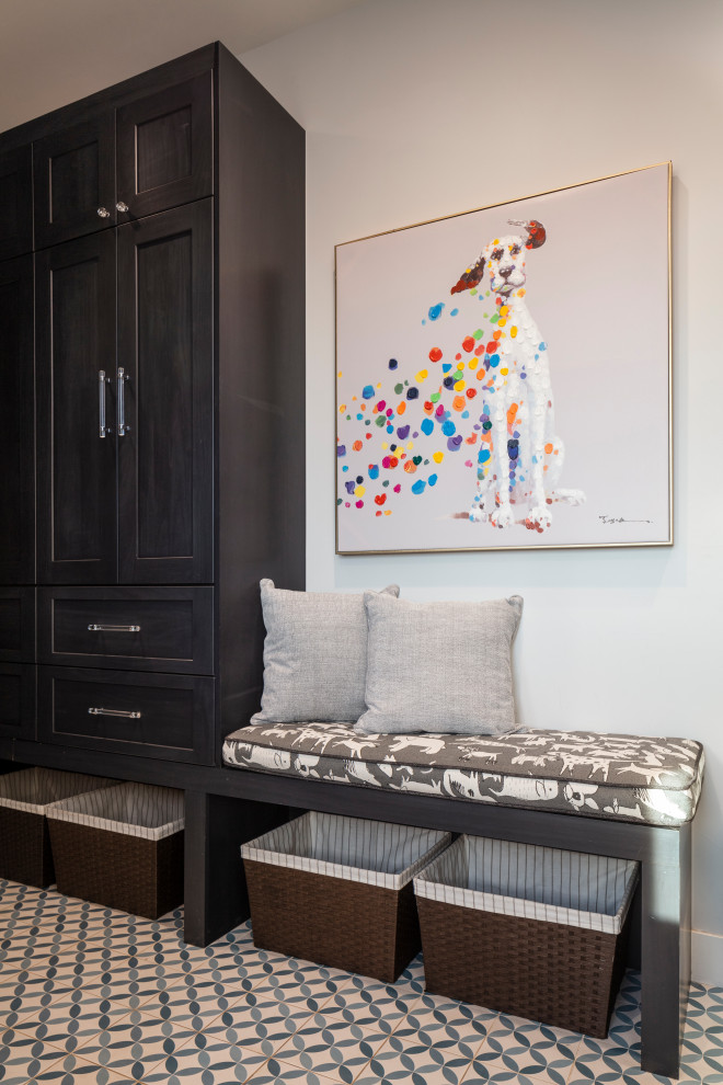 Inspiration for a mid-sized contemporary concrete floor and multicolored floor mudroom remodel in Denver