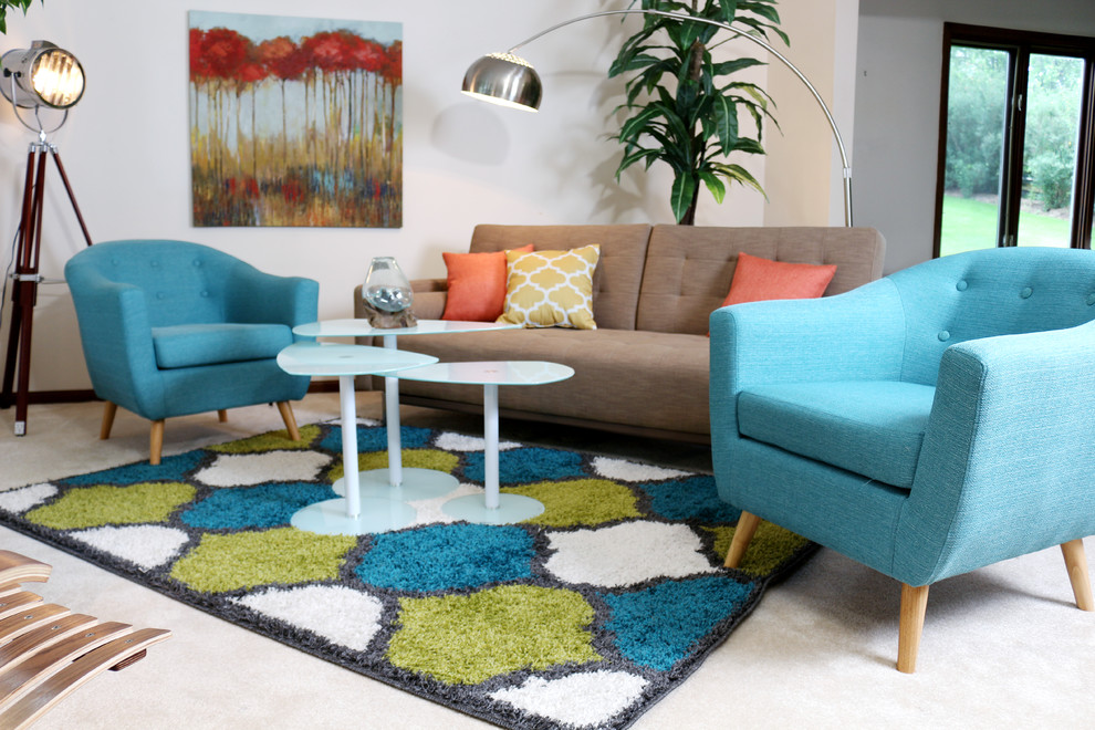 Inspiration for a mid-sized midcentury enclosed living room in Phoenix with carpet.