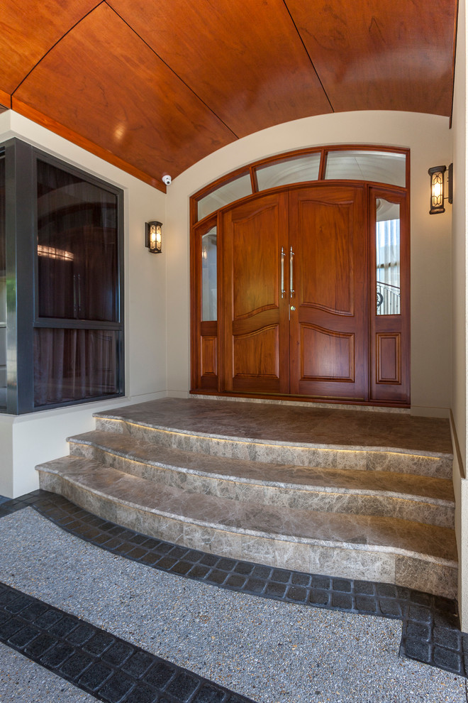 Large traditional front door in Perth with beige walls, travertine floors, a double front door and a medium wood front door.