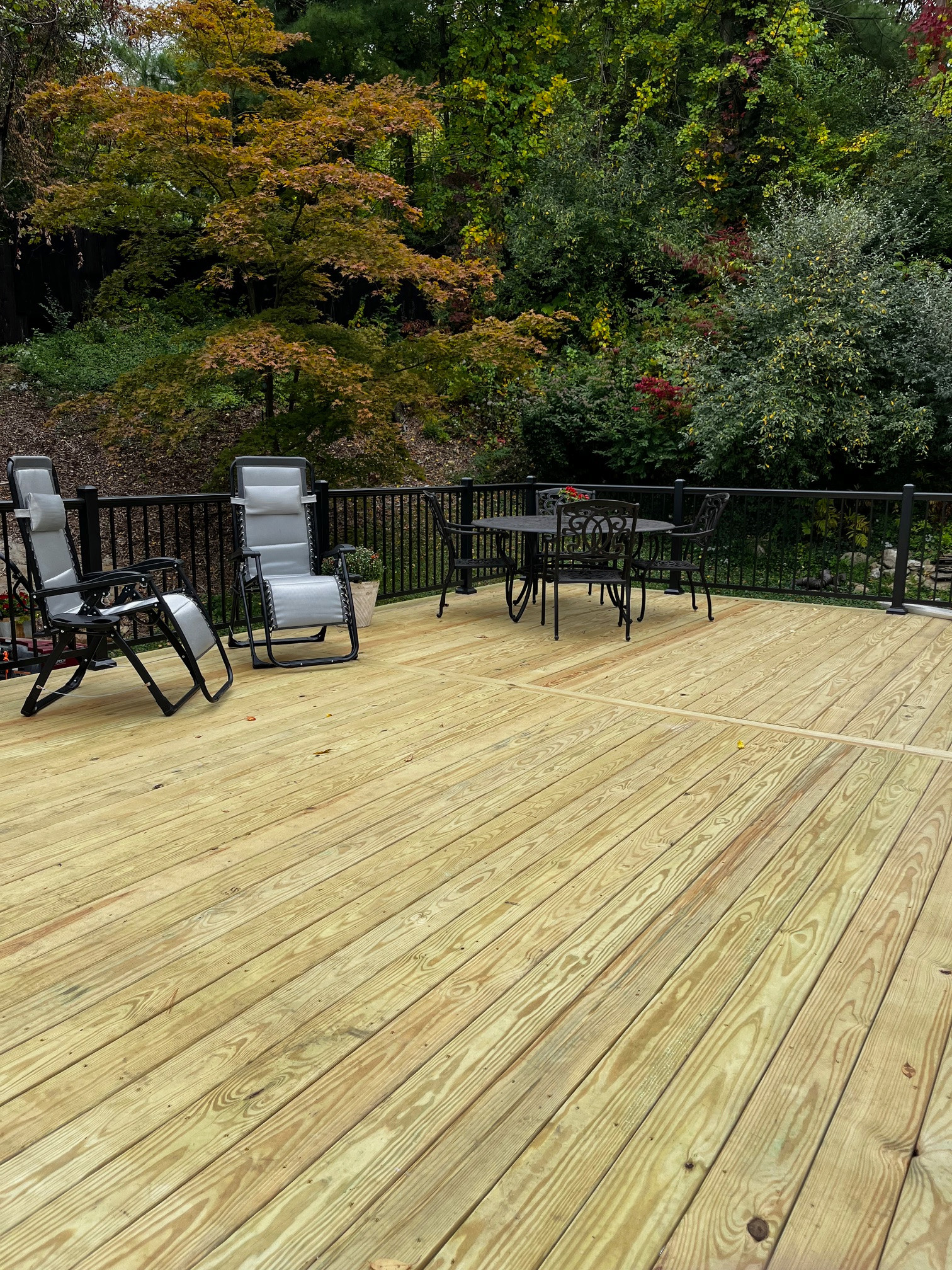 Large pressure treated wood deck