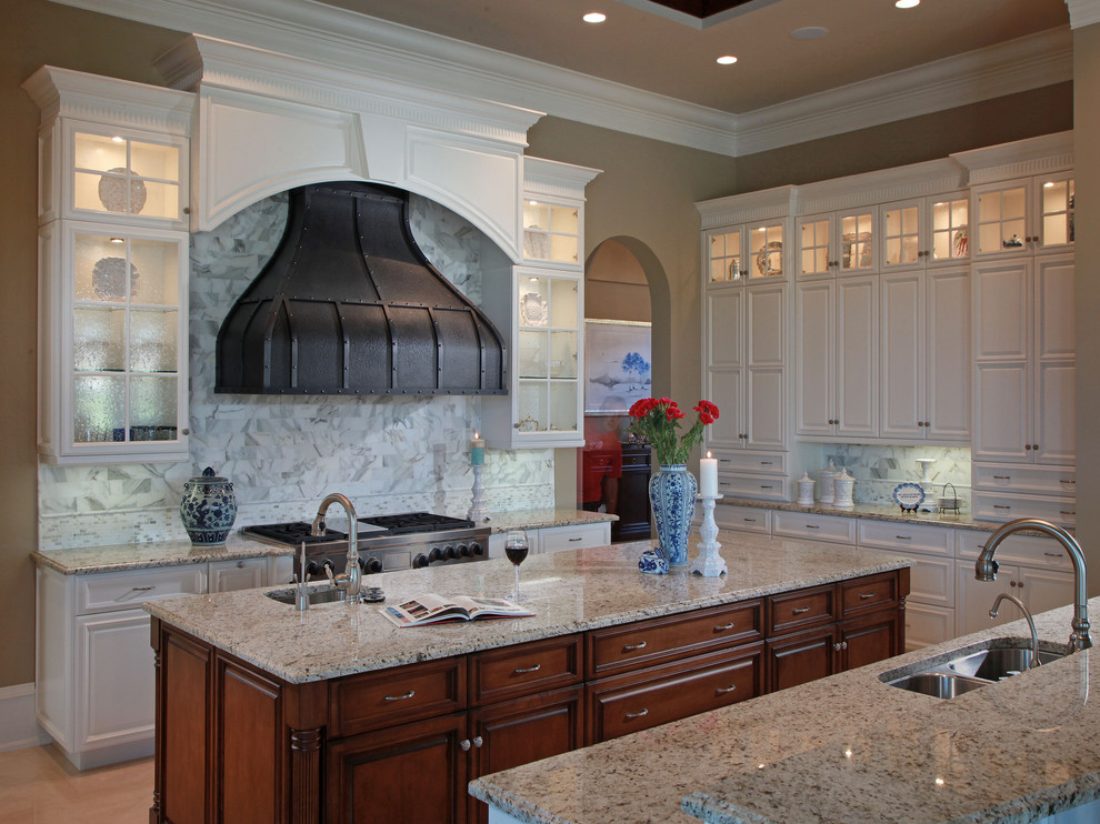 Photo of a traditional kitchen in Other with stainless steel appliances.