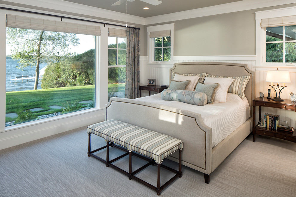 Mid-sized traditional master bedroom in Minneapolis with beige walls, carpet and grey floor.