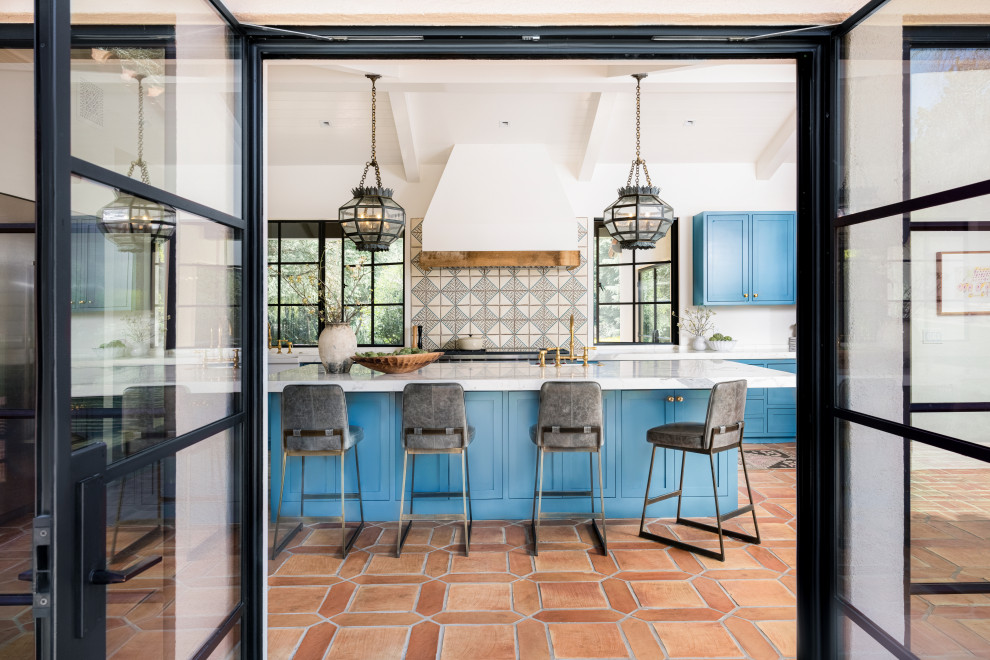 This is an example of a mediterranean kitchen in San Francisco with with island.