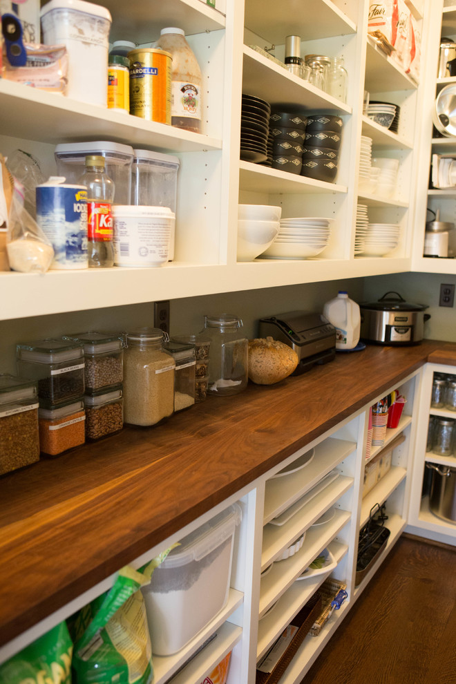 Large country l-shaped medium tone wood floor and brown floor kitchen pantry photo in Portland with a farmhouse sink, beaded inset cabinets, white cabinets, subway tile backsplash, stainless steel appliances, an island and gray countertops