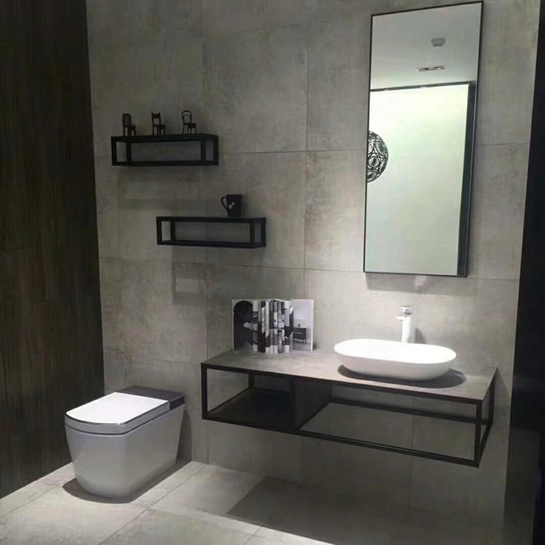 Photo of a large industrial master bathroom in Malaga with white cabinets, a one-piece toilet, brown tile, ceramic tile, brown walls, ceramic floors, a console sink, wood benchtops, grey floor, brown benchtops, an enclosed toilet, a single vanity, recessed and wood walls.