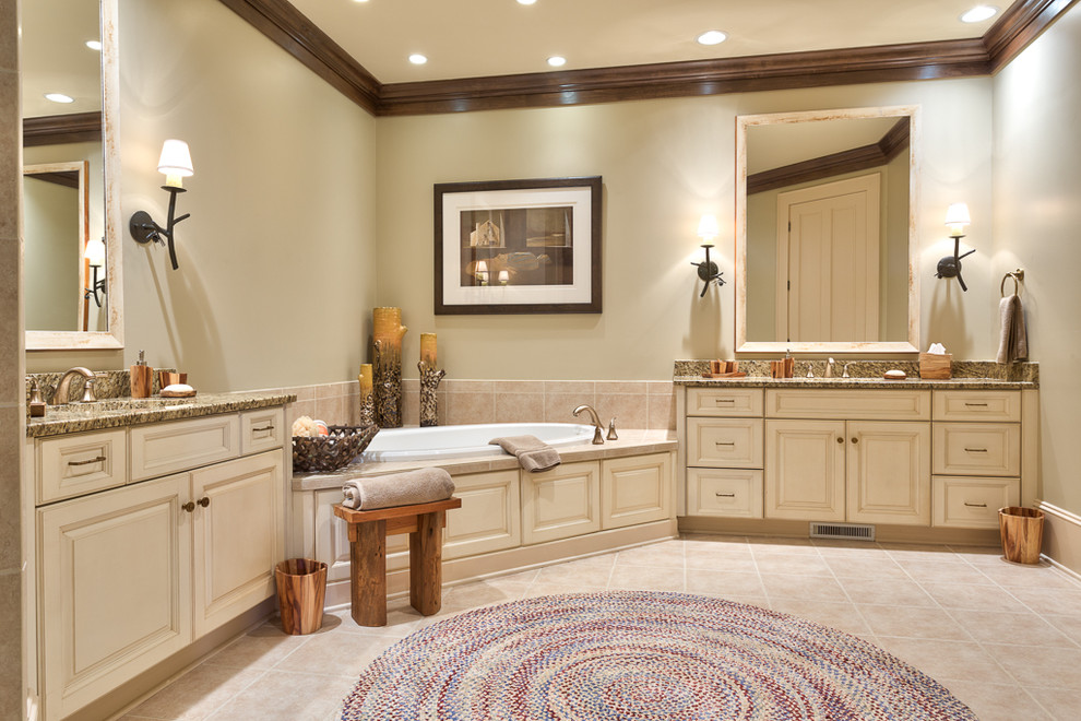 Design ideas for a large country 3/4 bathroom in Charlotte with beige cabinets, a drop-in tub, beige walls and grey benchtops.