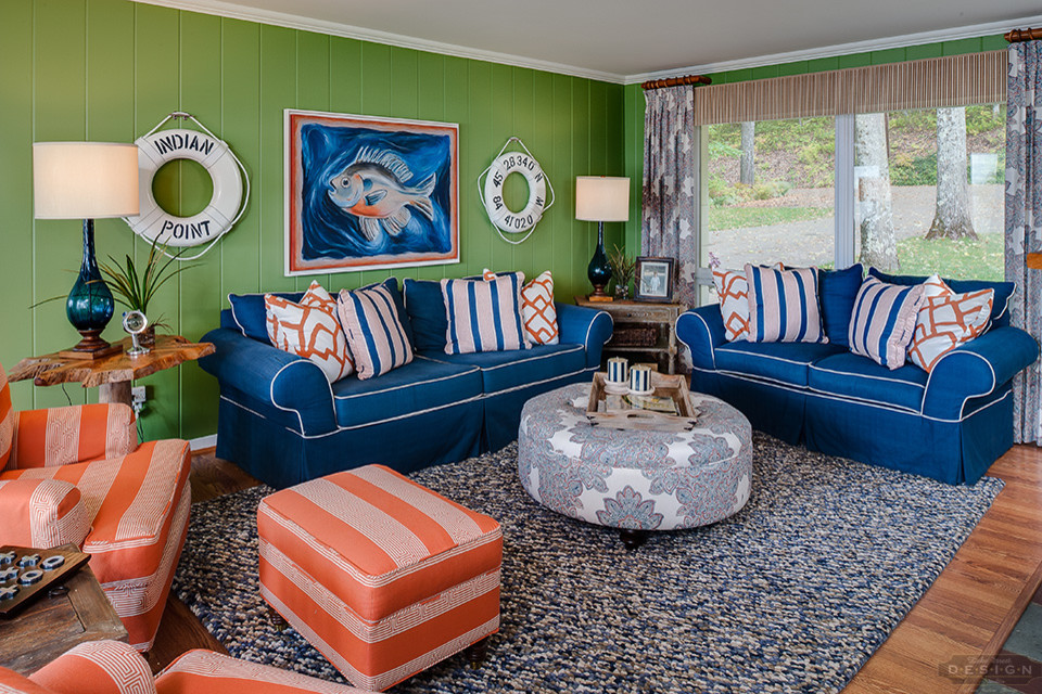 Mid-sized beach style open concept living room in Other with green walls, vinyl floors and no tv.