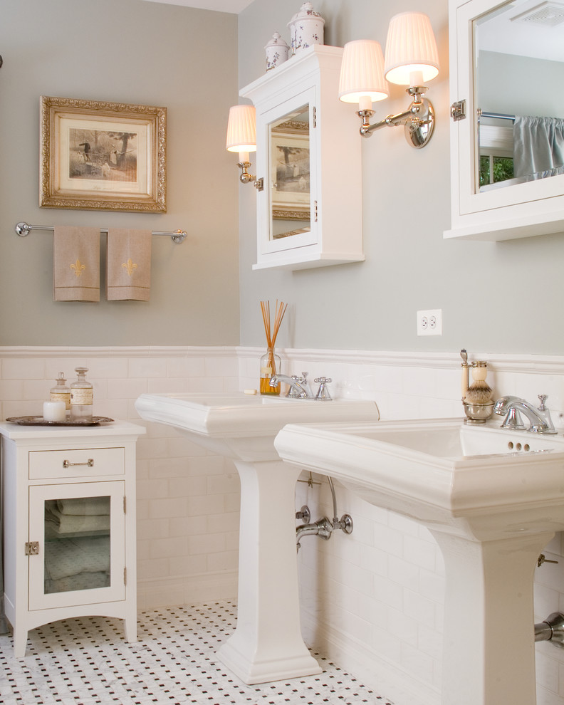 Design ideas for a traditional bathroom in Chicago with a pedestal sink, white cabinets and white tile.