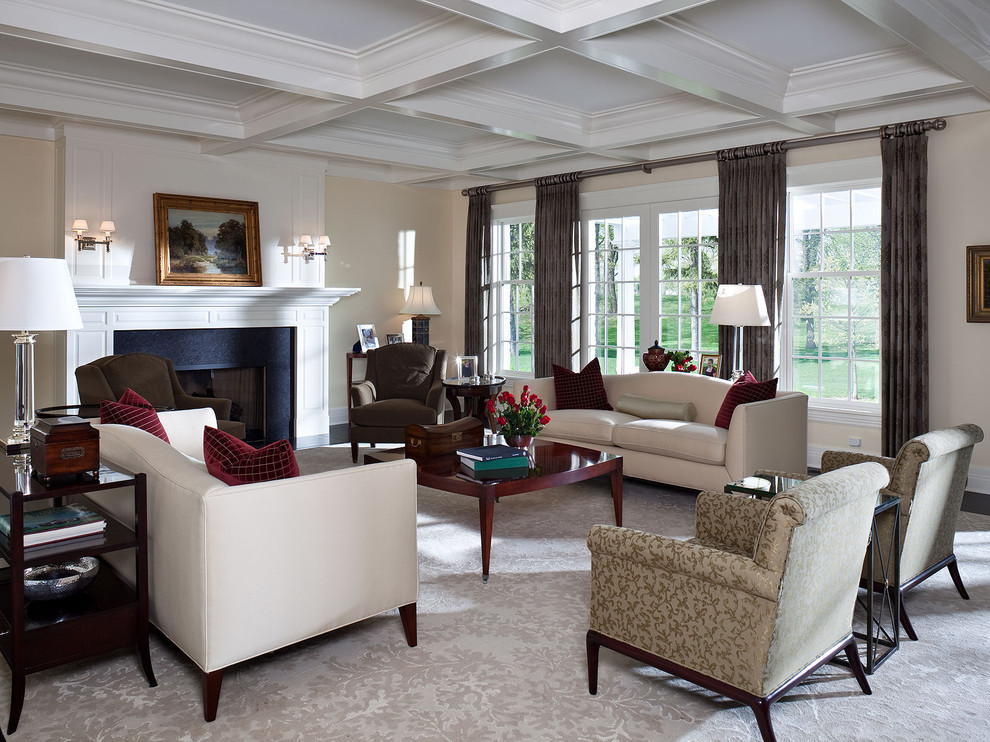 Inspiration for a mid-sized traditional formal enclosed living room in Minneapolis with beige walls, carpet, a standard fireplace, no tv and grey floor.