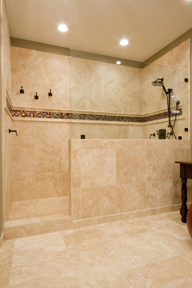 Inspiration for a large transitional master bathroom in Phoenix with flat-panel cabinets, dark wood cabinets, an open shower, a two-piece toilet, black tile, subway tile, green walls, travertine floors, an undermount sink and granite benchtops.