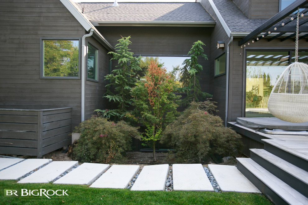 Design ideas for a large retro back garden in Salt Lake City with a pathway and concrete paving.