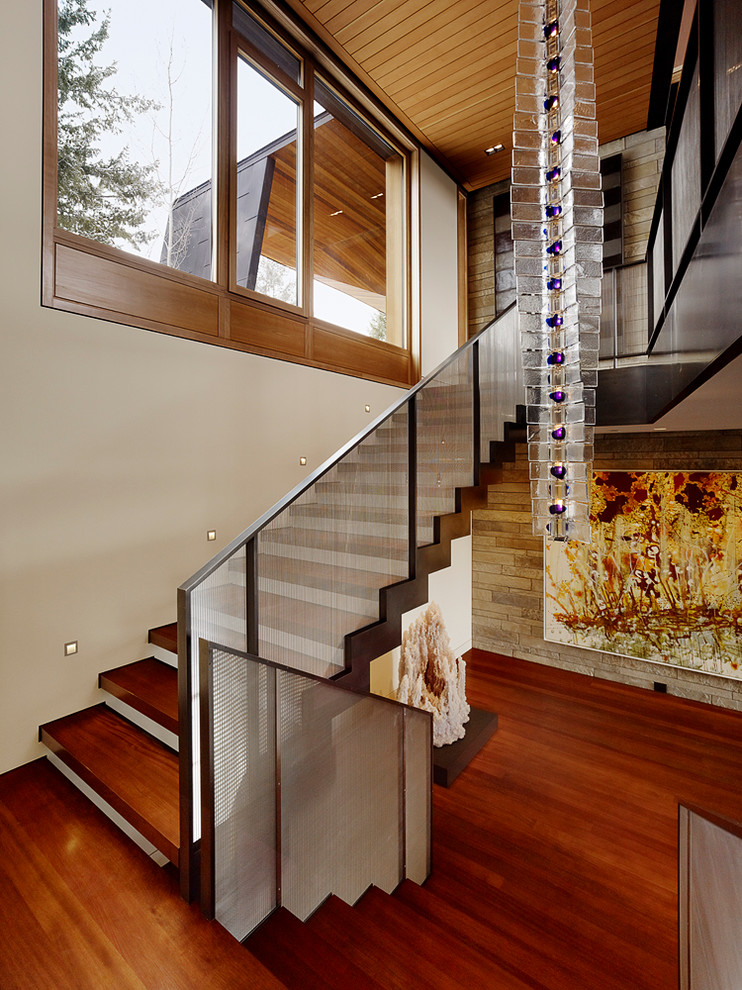 Contemporary wood staircase in Other.
