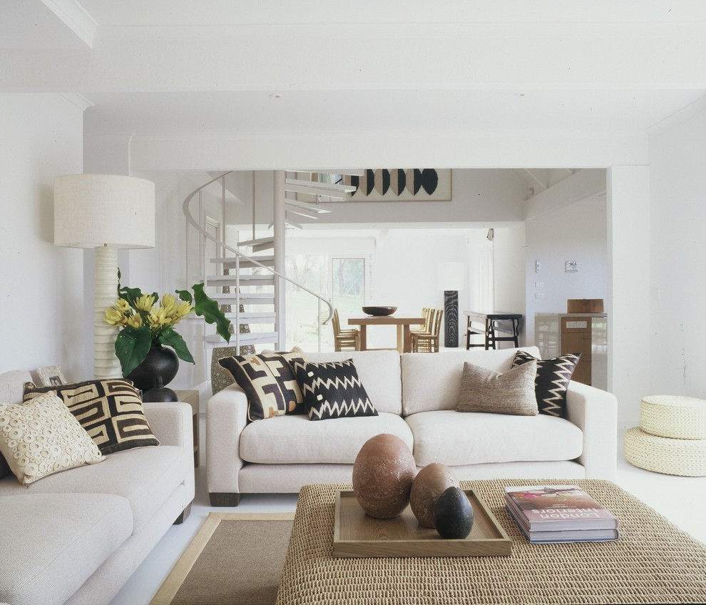 Design ideas for a small modern formal open concept living room in Melbourne with white walls, ceramic floors, no fireplace and a freestanding tv.