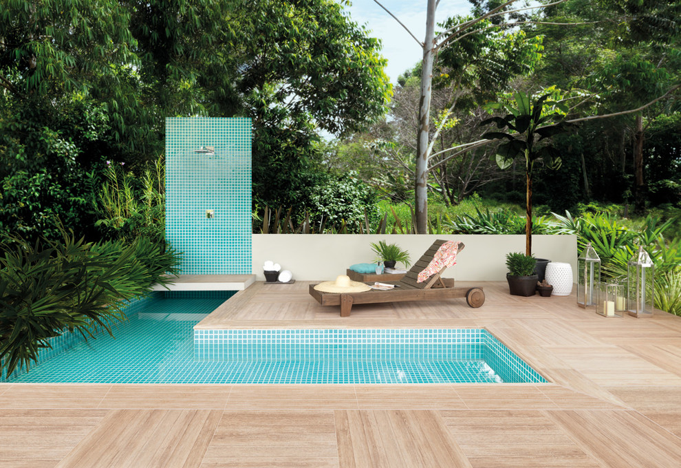 Design ideas for a contemporary pool in Melbourne with decking.