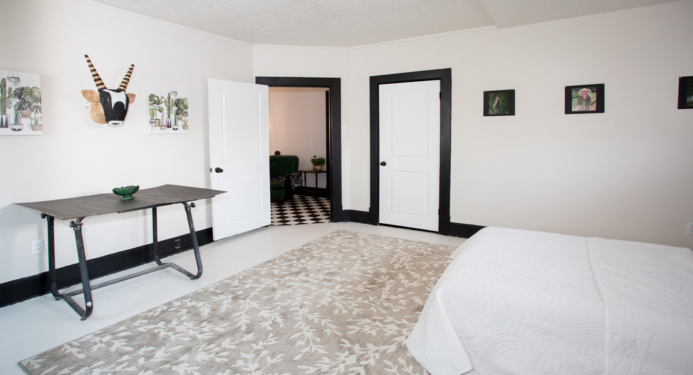 Example of a large transitional guest painted wood floor and white floor bedroom design with white walls