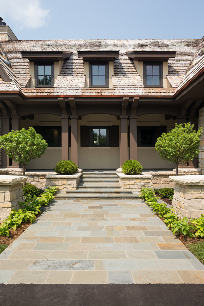 Inspiration for a transitional beige two-story mixed siding gable roof remodel in Minneapolis