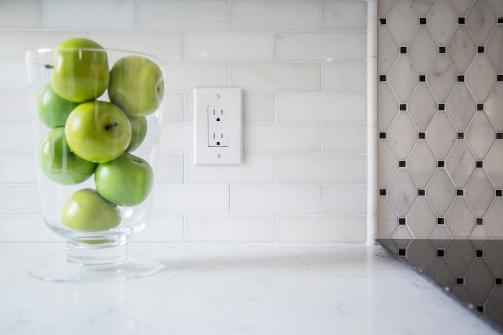 Example of a transitional kitchen design in Toronto