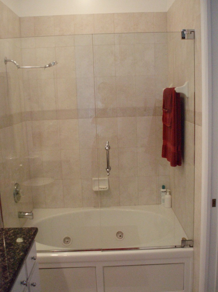 Transitional 3/4 beige tile and ceramic tile ceramic tile and beige floor alcove shower photo with beige walls and a hinged shower door