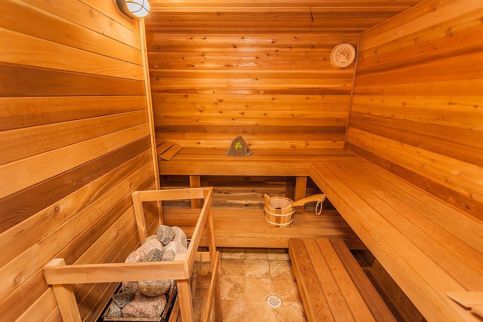 Large traditional bathroom in Toronto with with a sauna, brown walls and ceramic floors.