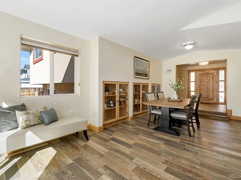 Transitional dining room photo in Denver