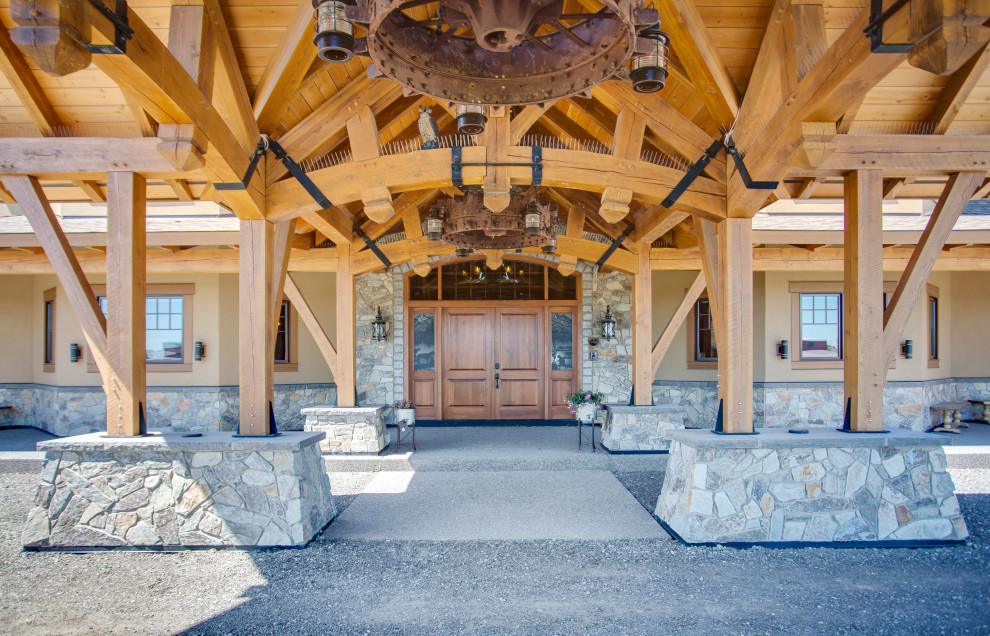 Mountain style home design photo in Calgary