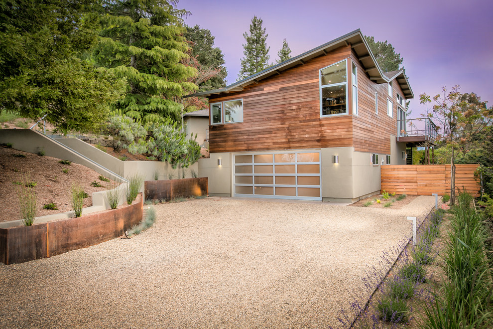Large contemporary two-storey exterior in San Francisco with wood siding and a shed roof.