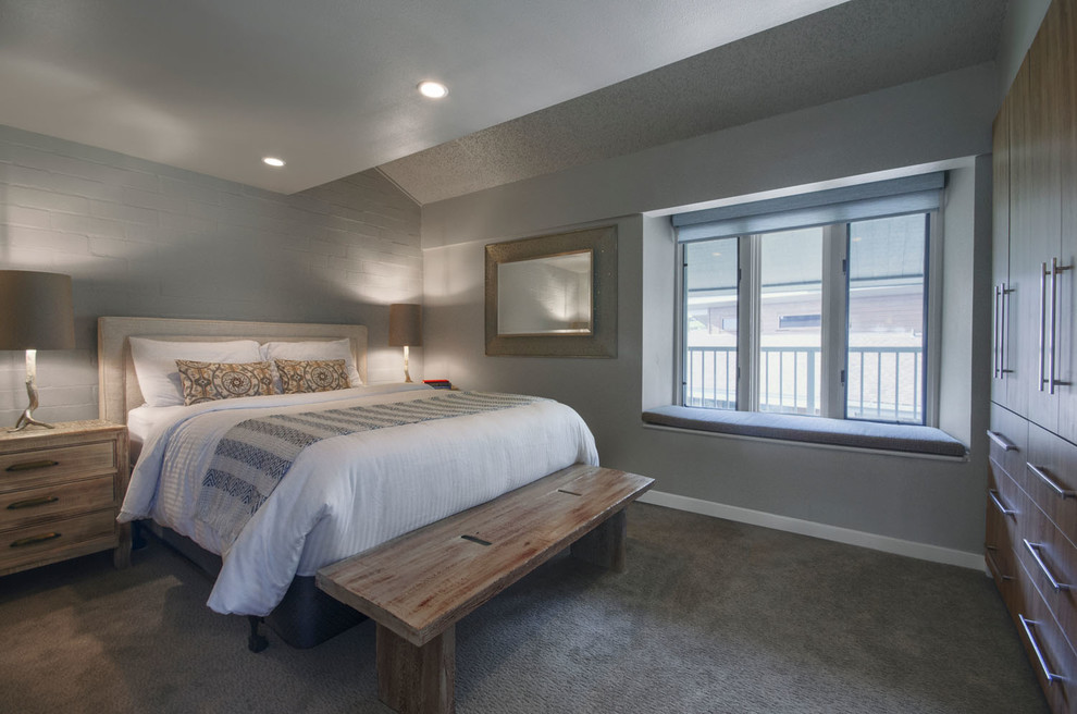 Design ideas for a mid-sized modern master bedroom in Denver with grey walls and carpet.