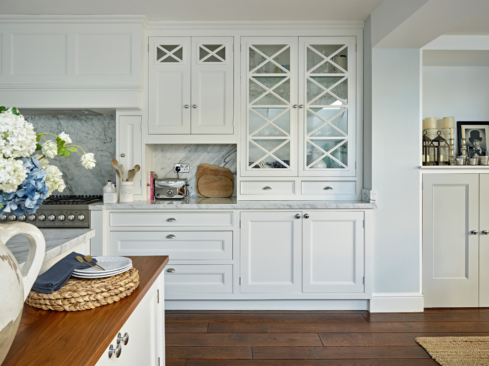Inspiration for a large transitional kitchen in London.