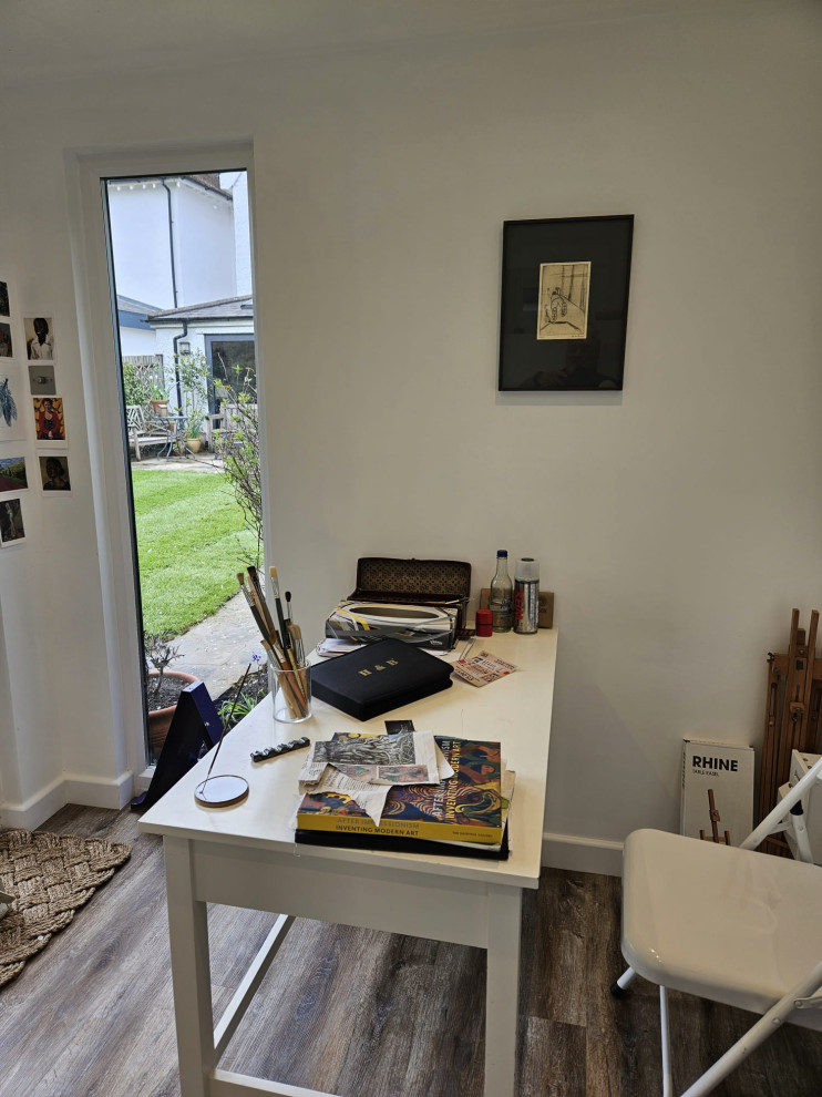 Design ideas for a medium sized rustic home office in London.