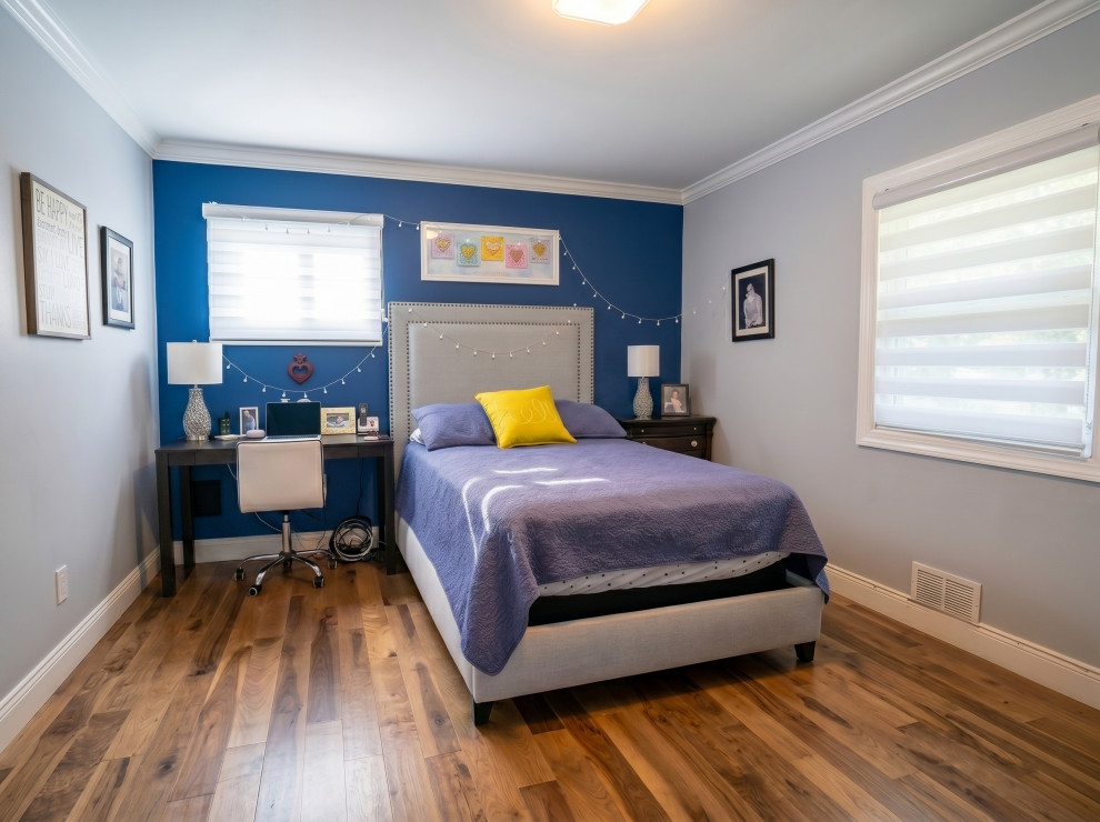 Kids Bedroom with Navy Accent Wall and Desk Nook