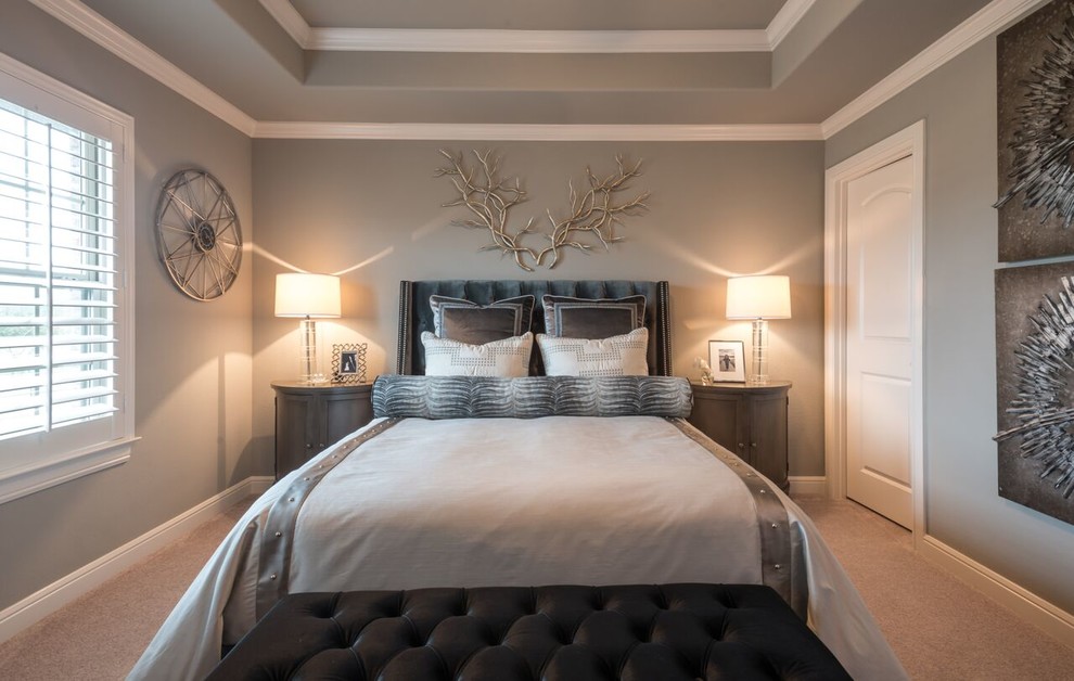 This is an example of a mid-sized transitional guest bedroom in Dallas with grey walls, carpet, no fireplace and grey floor.