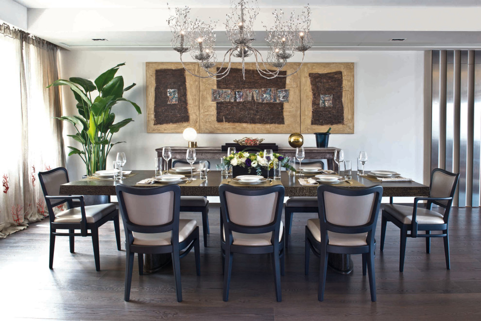 Inspiration for a large modern dining room in Hong Kong with beige walls and medium hardwood flooring.