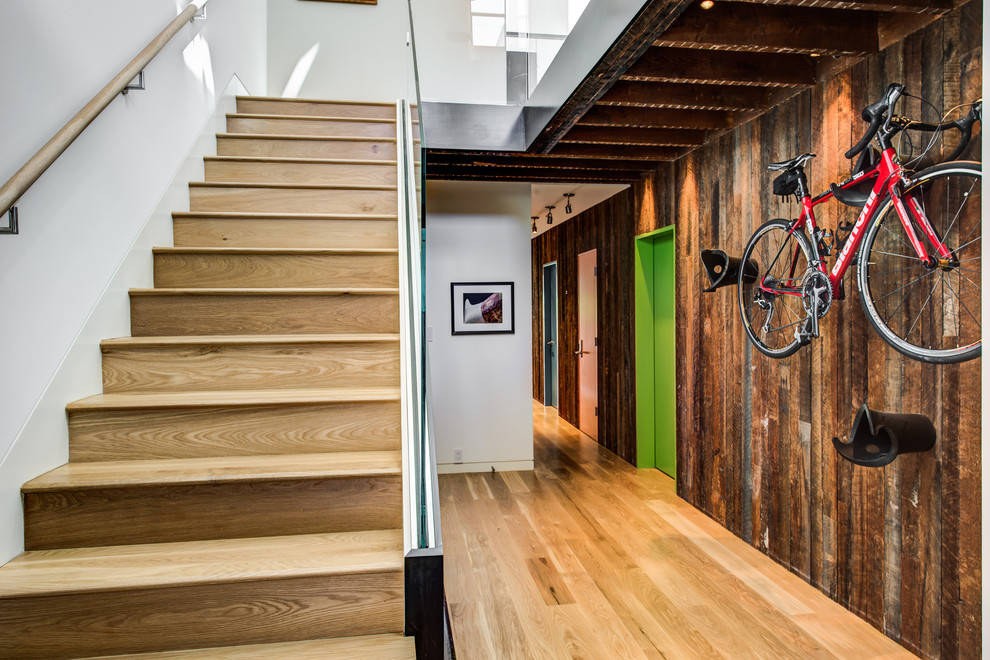 Contemporary wood straight staircase in San Francisco with wood risers.
